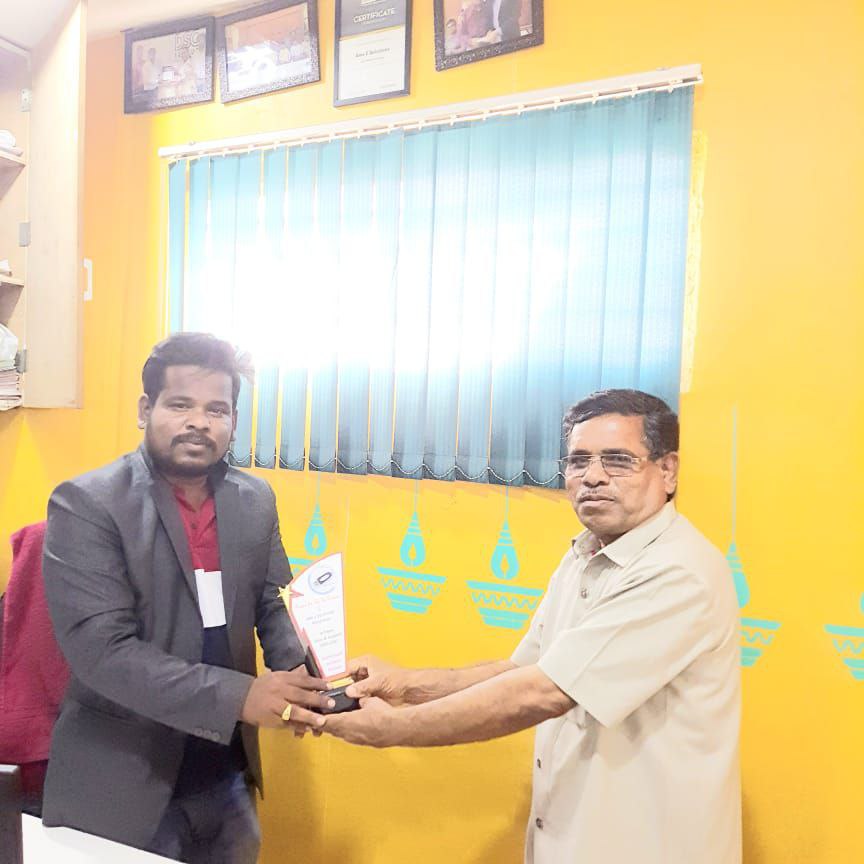 Award being presented at the SMS E Solutions office in Kalaburagi